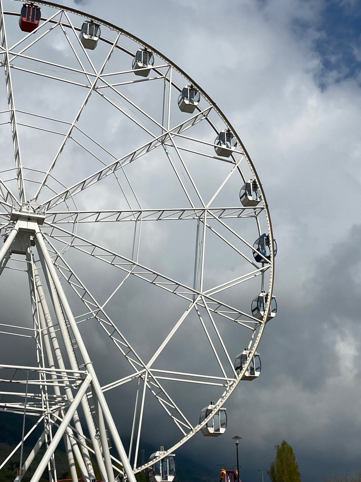 Spring scenes documented at Gagra waterfront featuring Ferris wheel