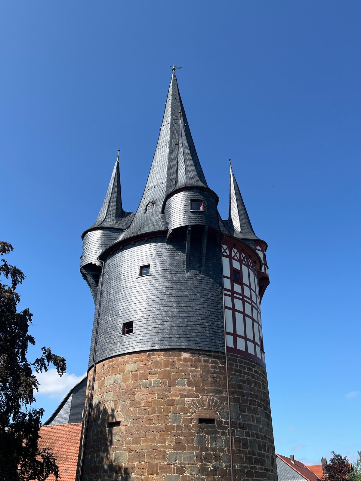 Exploring Neustadt's historic towers, church, and streets on a summer afternoon