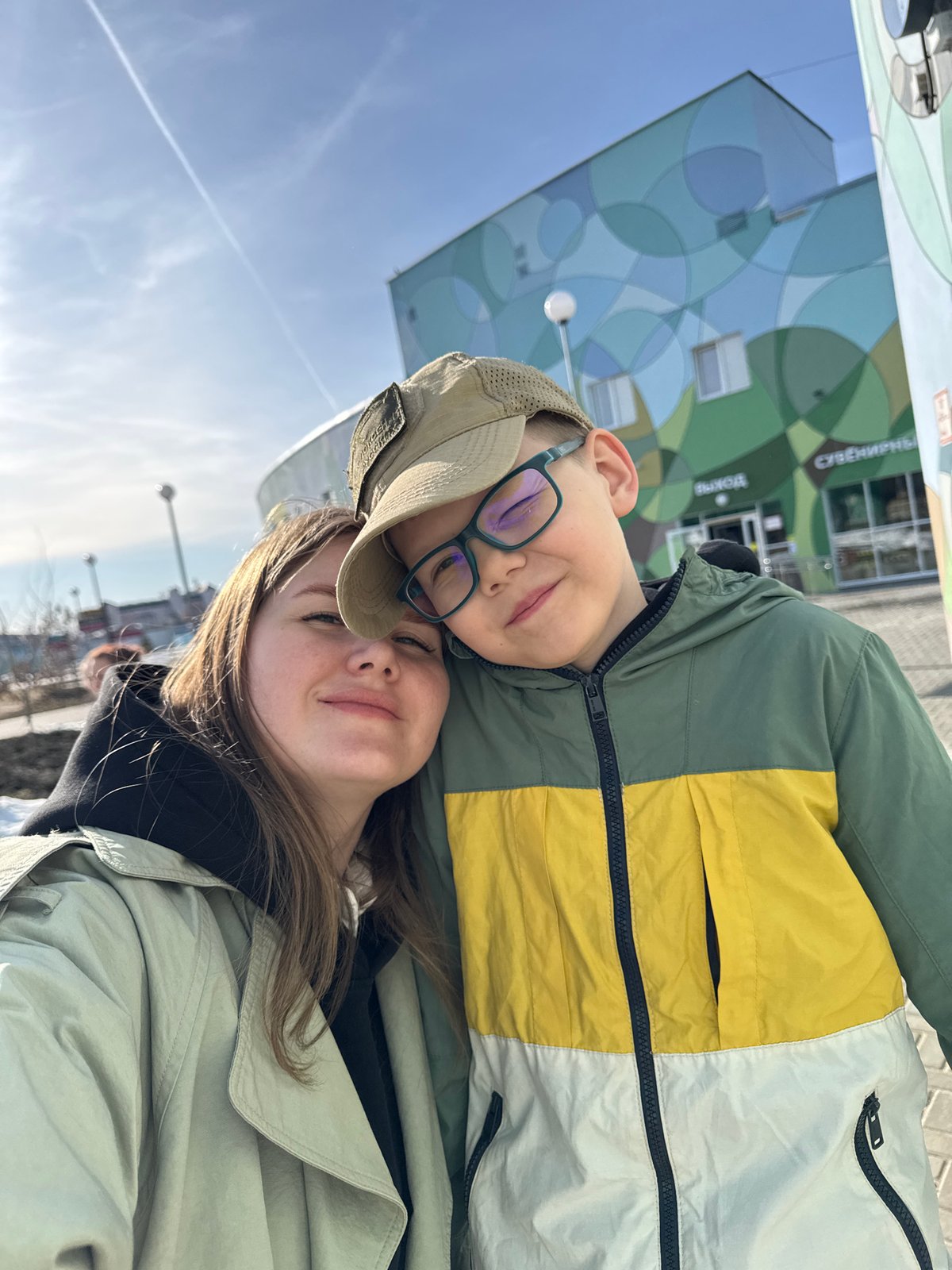 Family enjoys zoo visit in Perm on sunny winter day