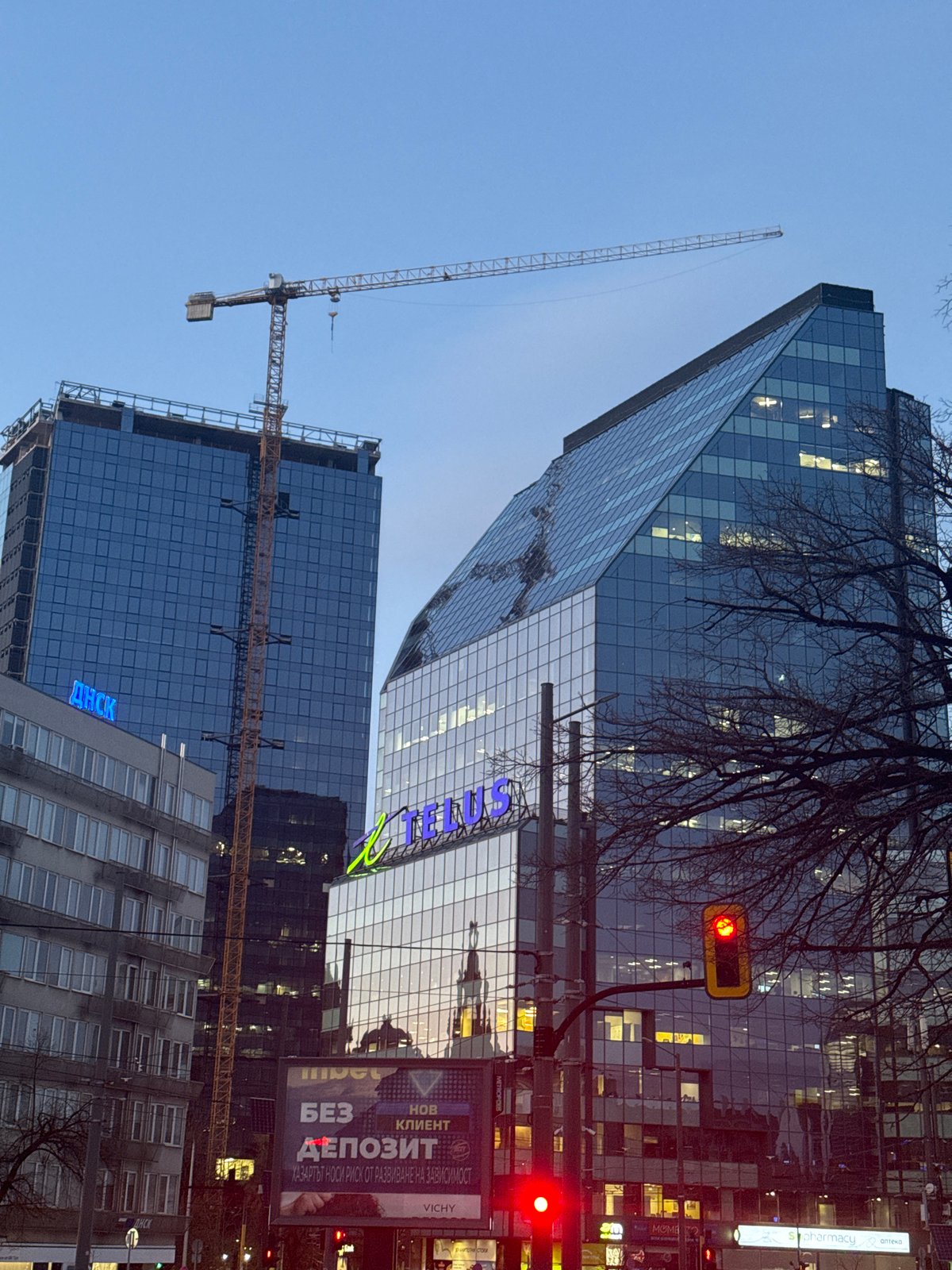 Evening scenes captured across Sofia including buildings, trams, plant