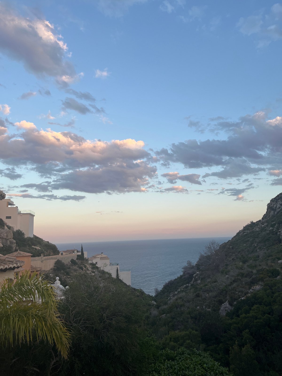 Dramatic dusk skies captured over Spanish coastal town