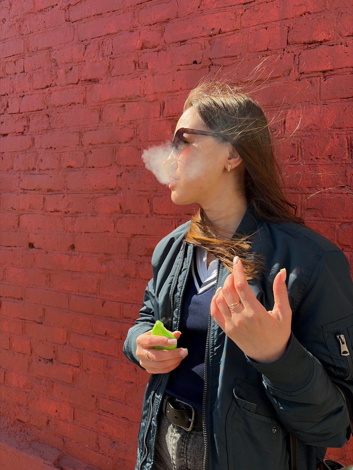 Women conduct photo session at Izhevsk murals and streetscapes