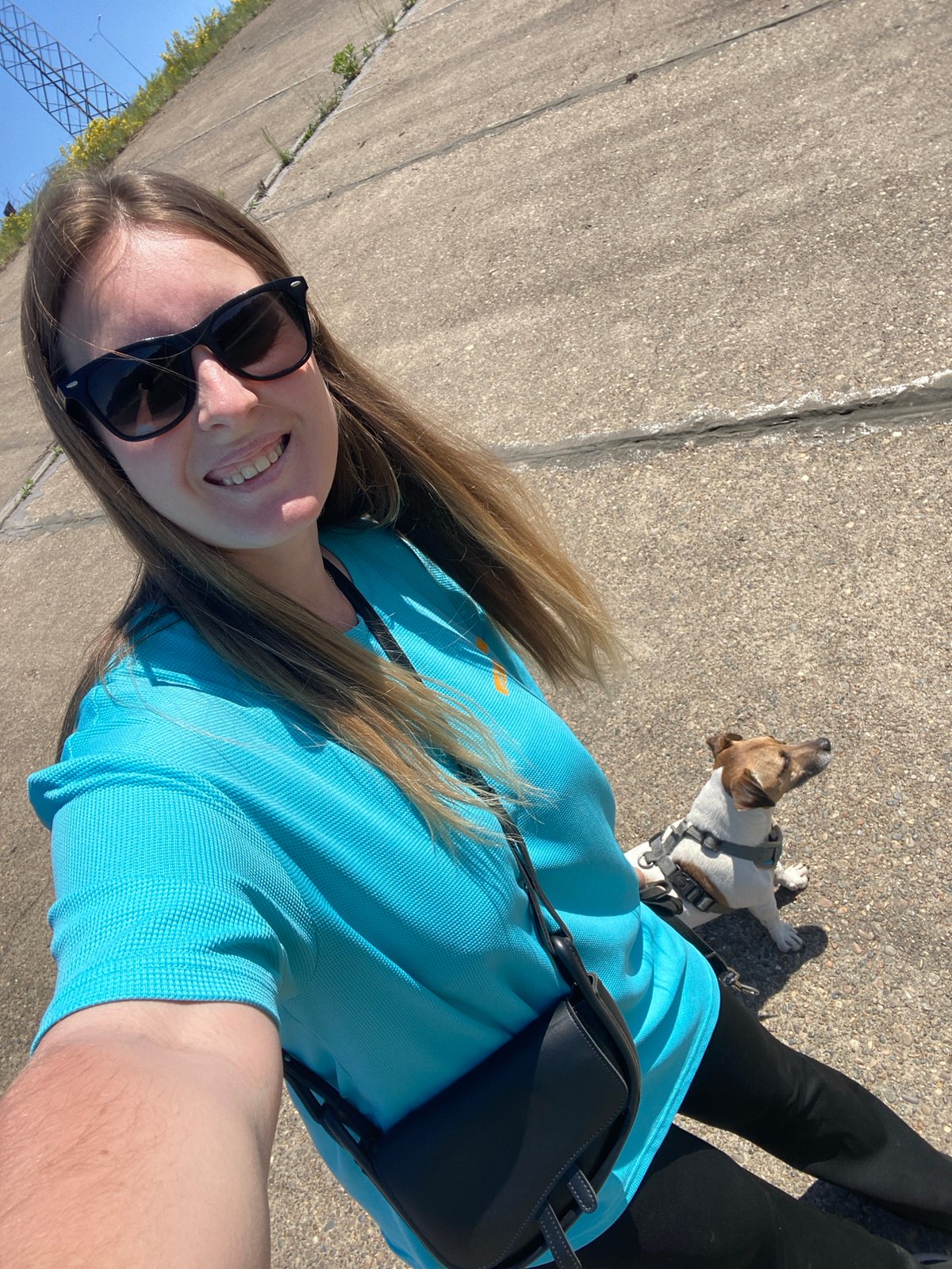 Woman takes morning selfies with dog in Russian town