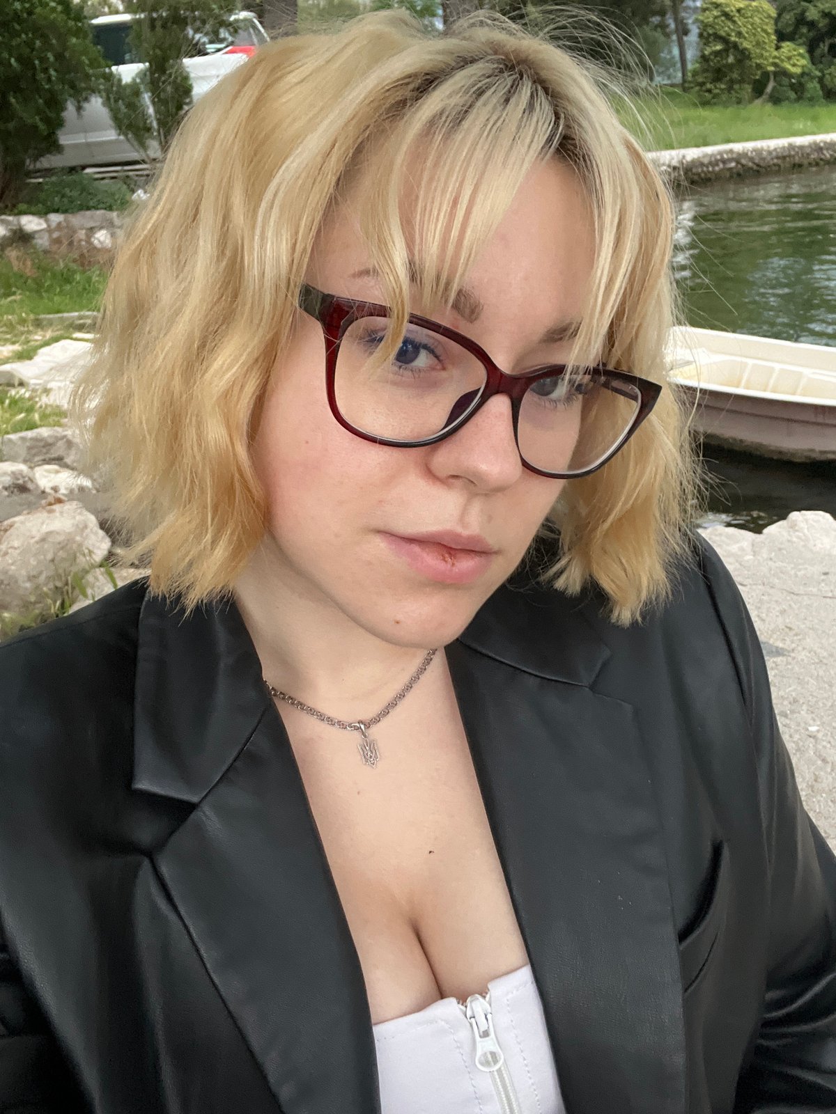 Woman photographed amid Bay of Kotor scenes in Dobrota