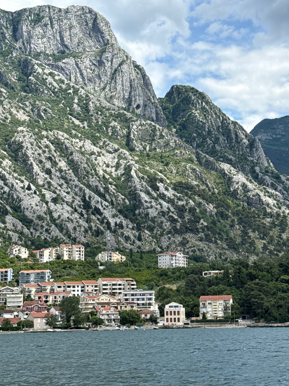 Boats Navigate Bay of Kotor Waters Near Dobrota, Montenegro