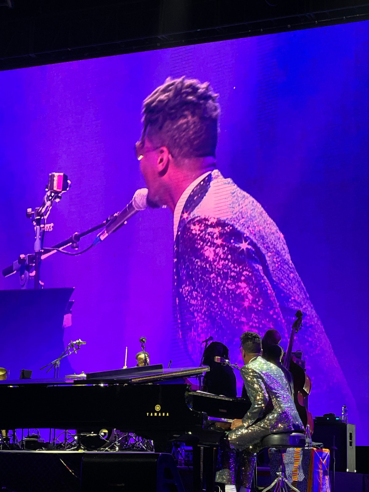 Sequined pianist performs concert in Salembaran, Indonesia