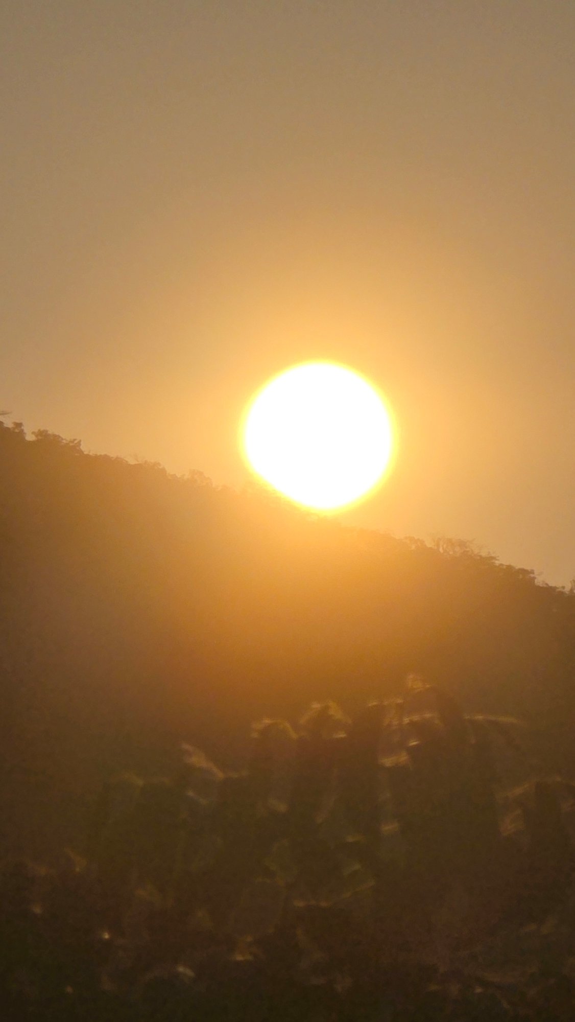 Hazy sunset landscape captured at Vietnam natural heritage site