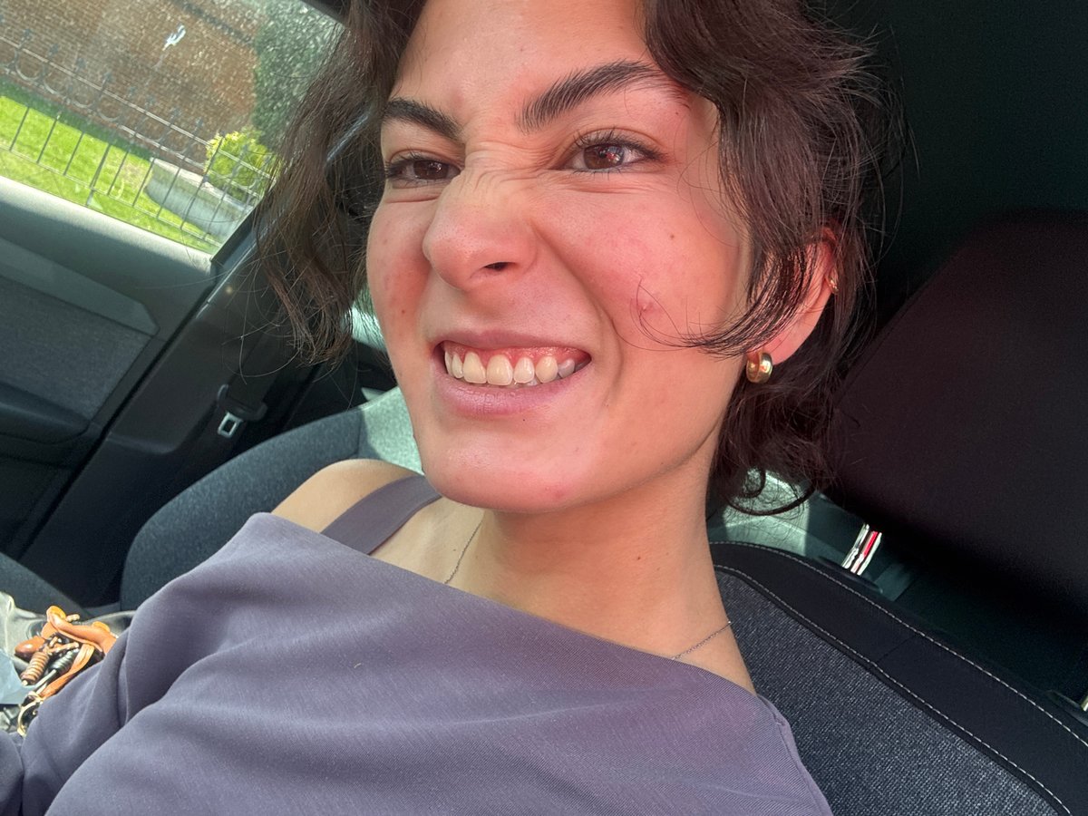 Woman takes selfies in car in Mexican town