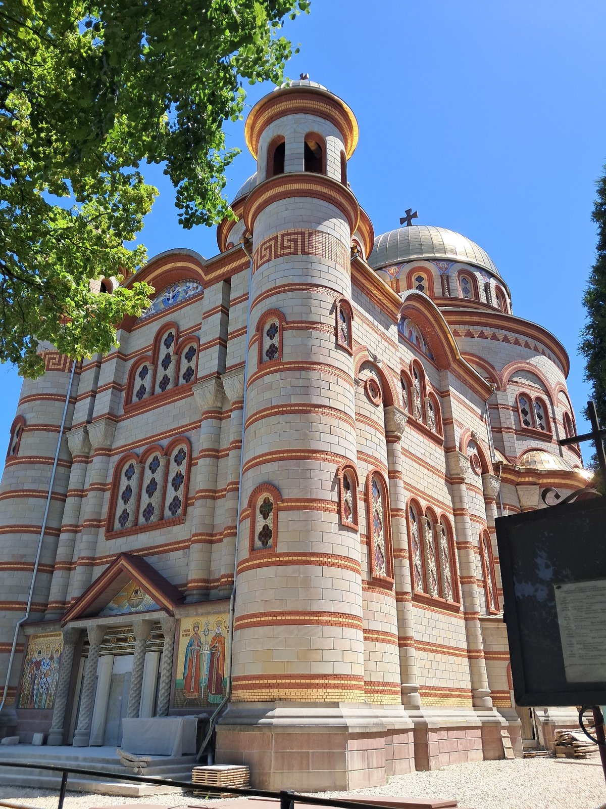 Ice cream and street life near a grand domed church