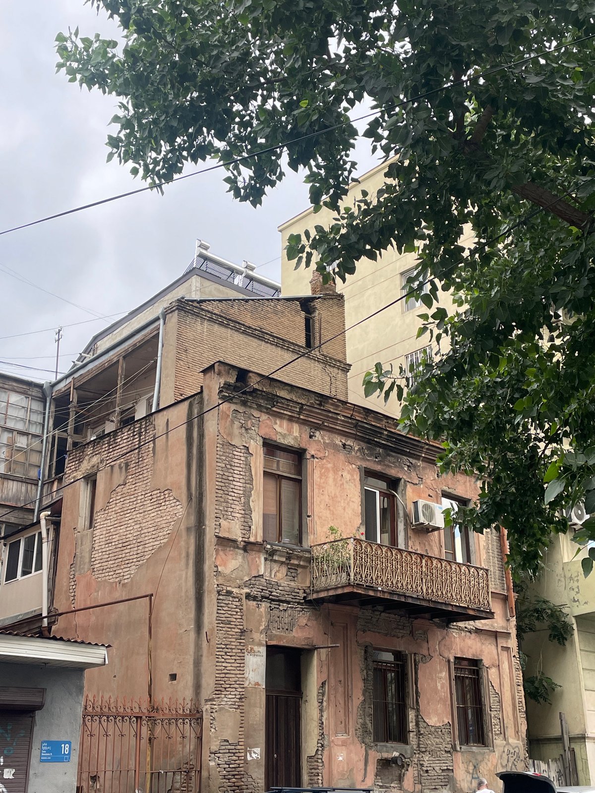 Old Tbilisi apartment district, caught mid-renovation and mid-summer