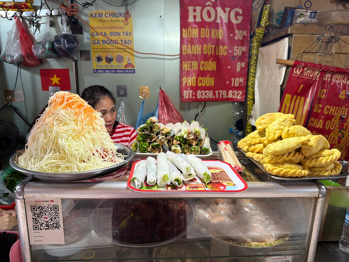 Early morning food scene documented across Hanoi establishments