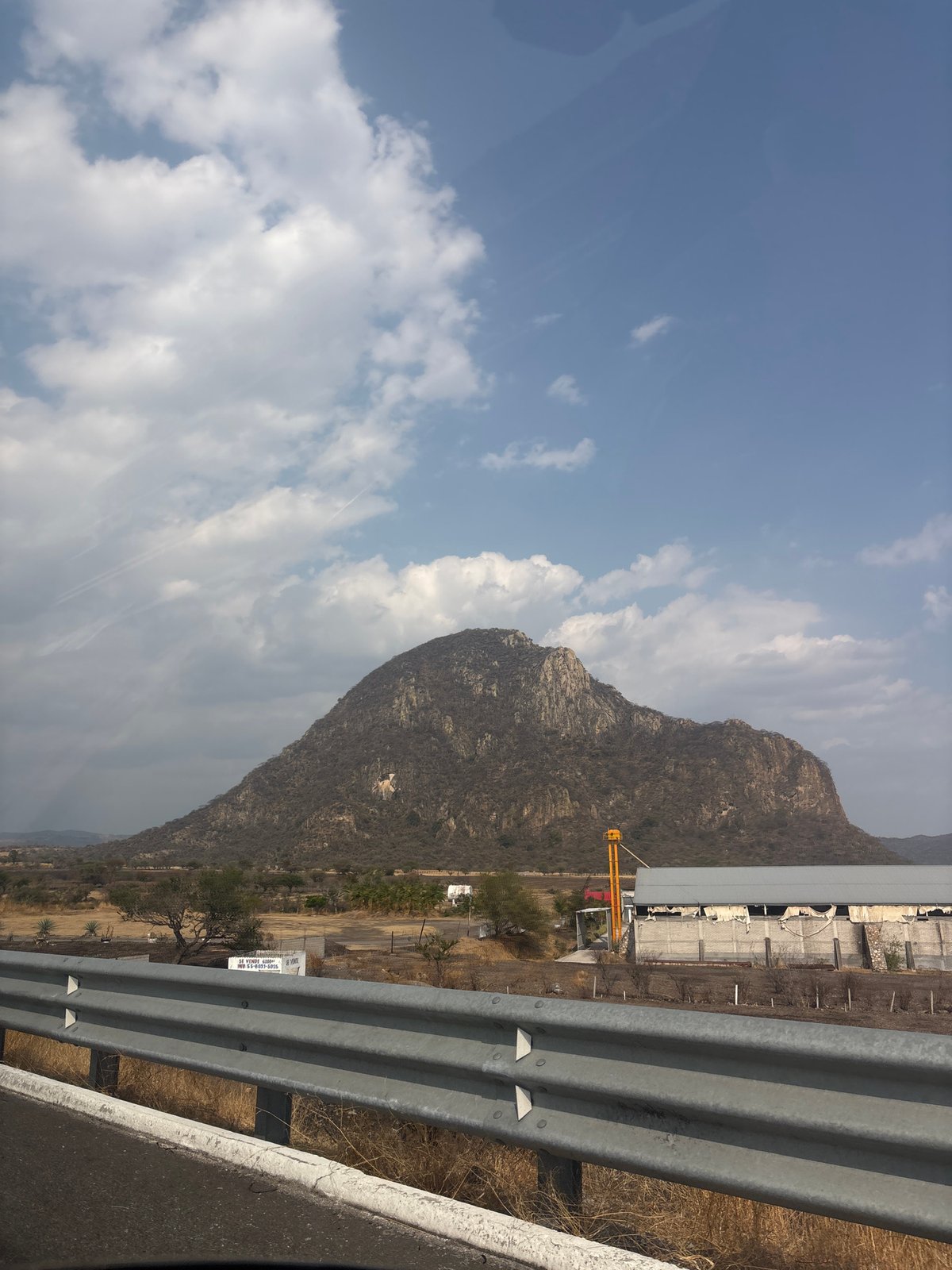 Highway traveler documents mountain landscapes near Jantetelco, Mexico