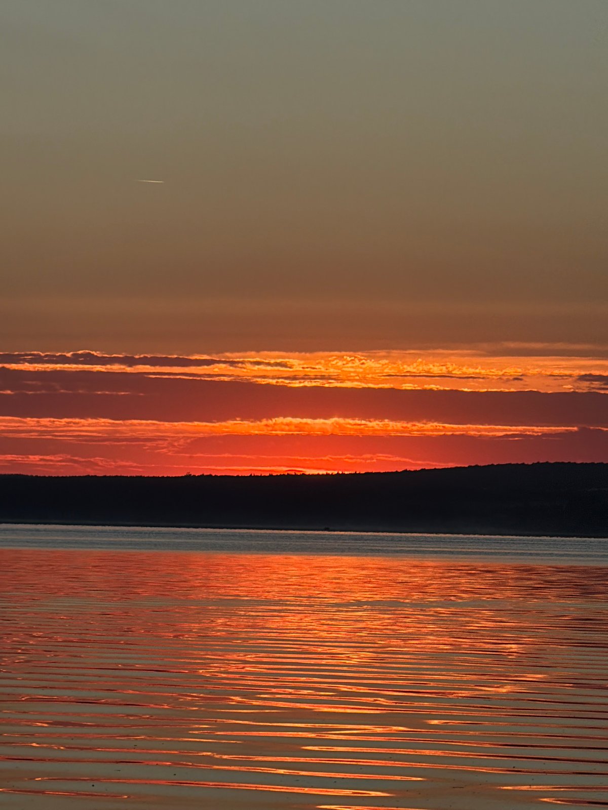 Sunset fishing on the Chaikovsky waterfront