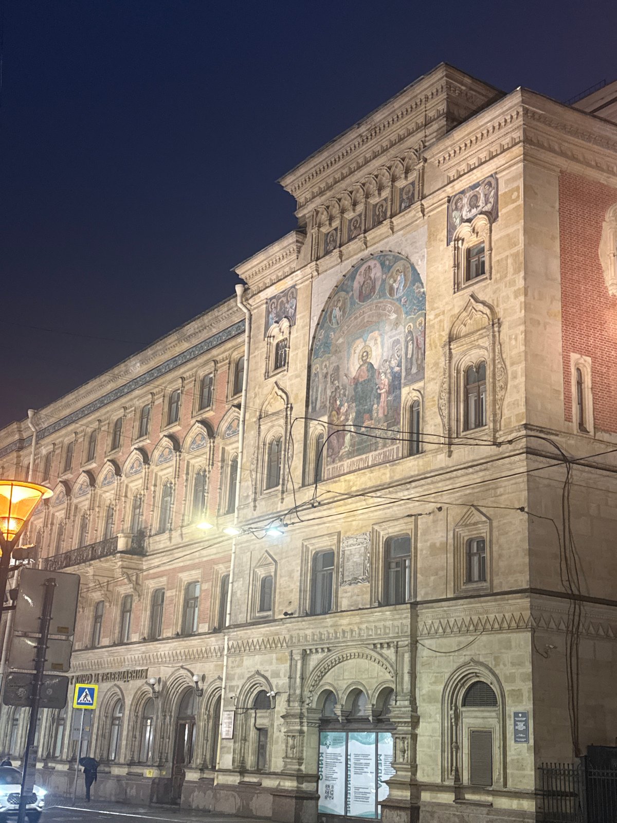 Nighttime architectural tour documented across rainy Saint Petersburg