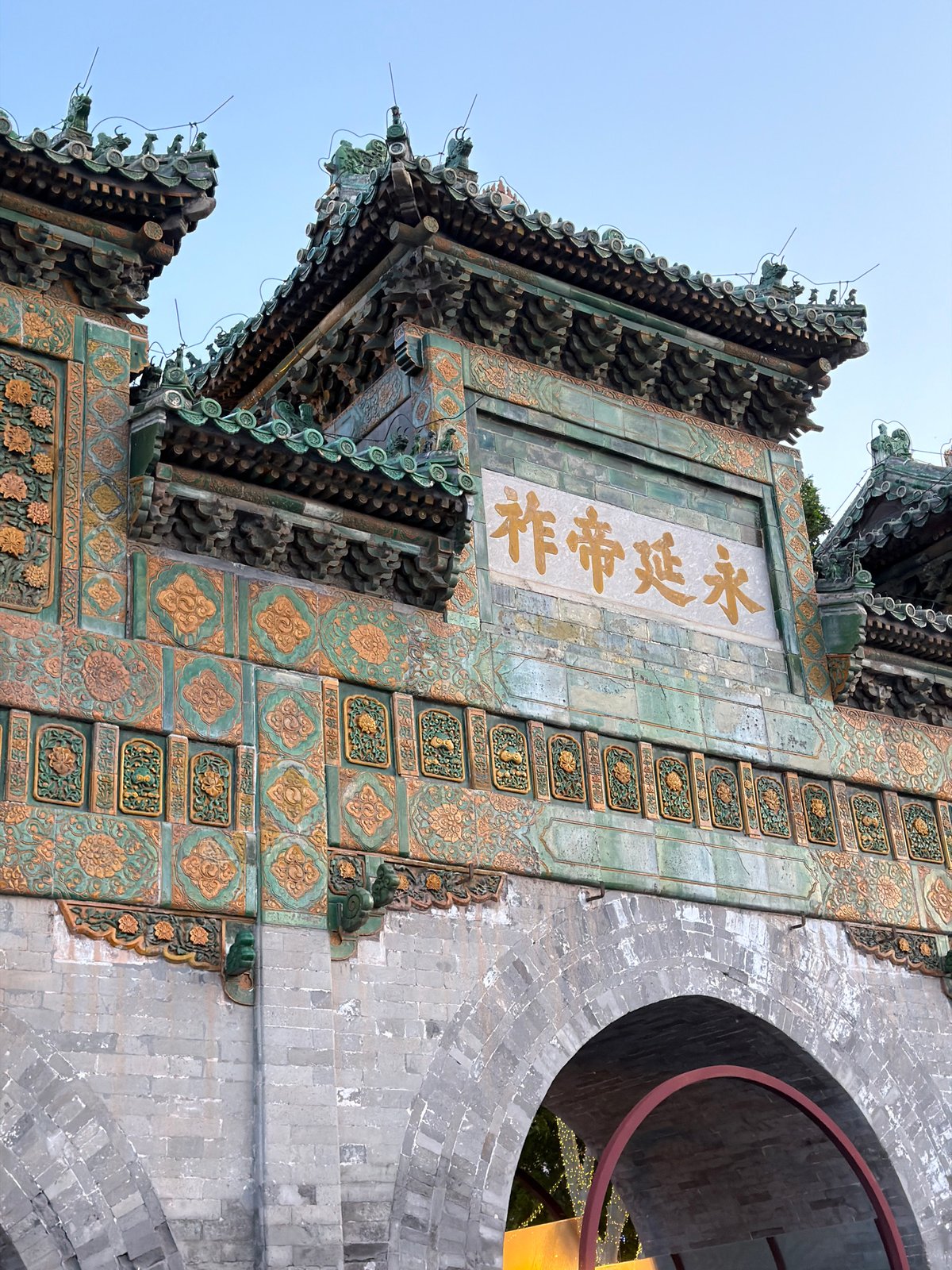 Tourist visits ornate Deheyuan Theater at Beijing Summer Palace