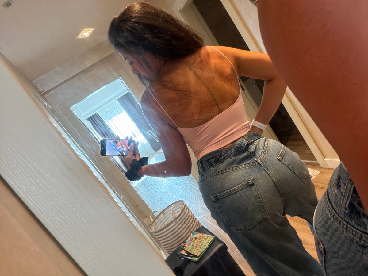 Mirror selfie session in a Gabrovo hallway, July 2026