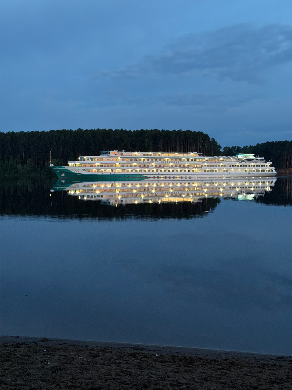 Cruise ships dock in Chaikovsky as evening fishing continues