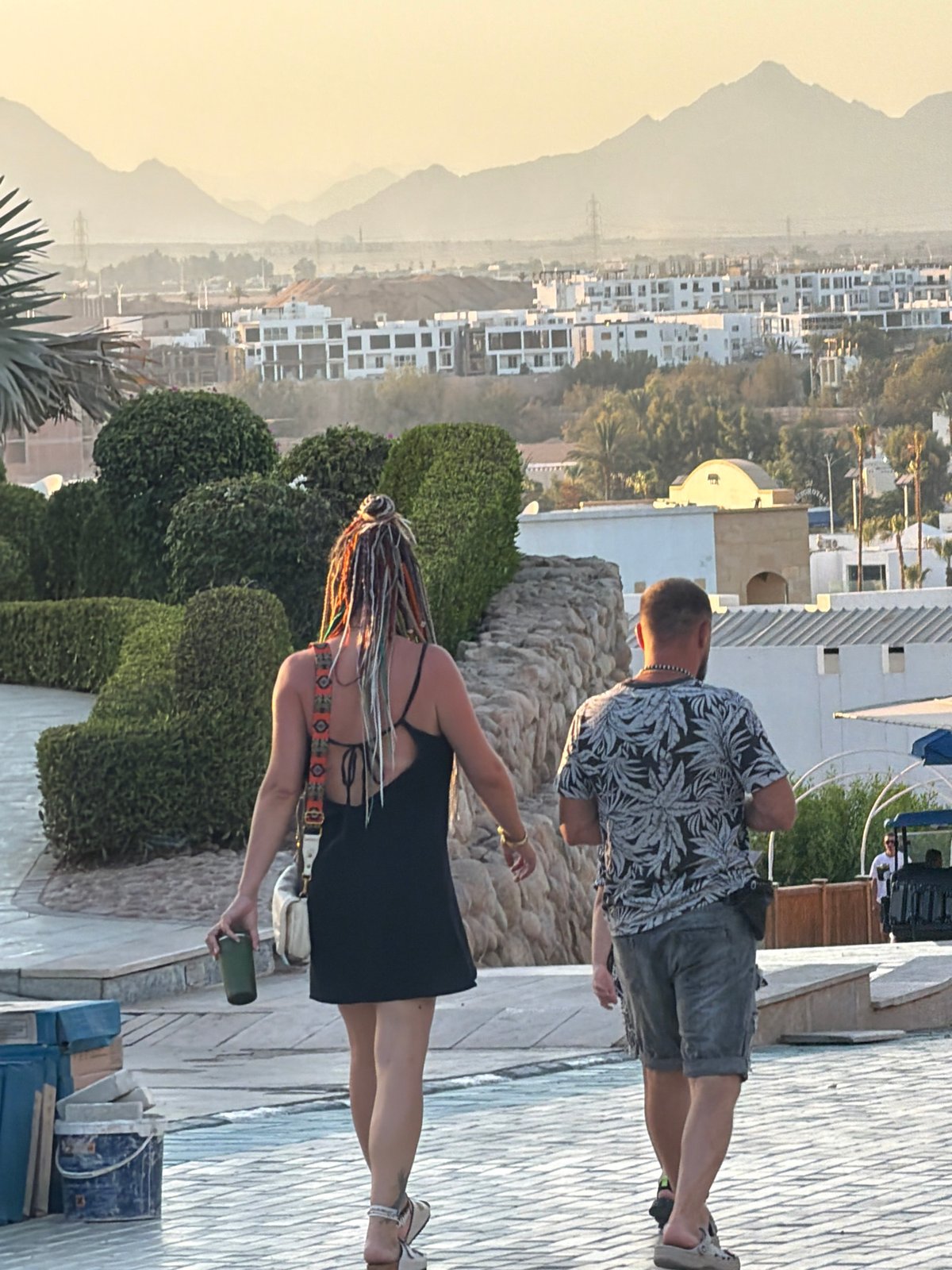 Poolside activity at a Sharm El Sheikh resort on a sunny afternoon
