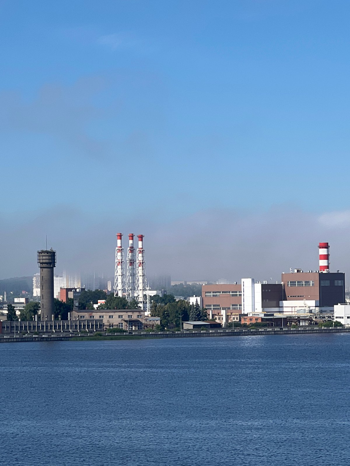 Izhevsk reservoir embankment on a calm summer morning