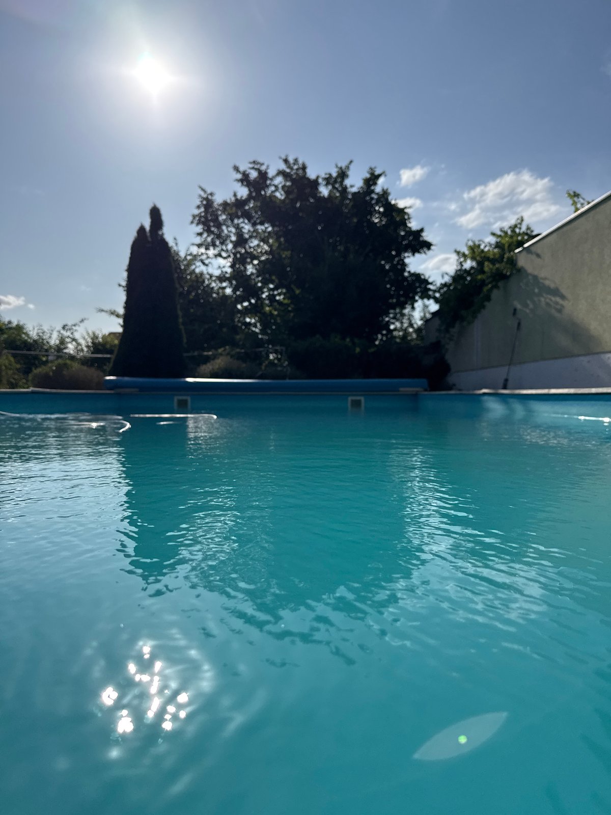 Sunny afternoon at an outdoor pool in Wettstetten
