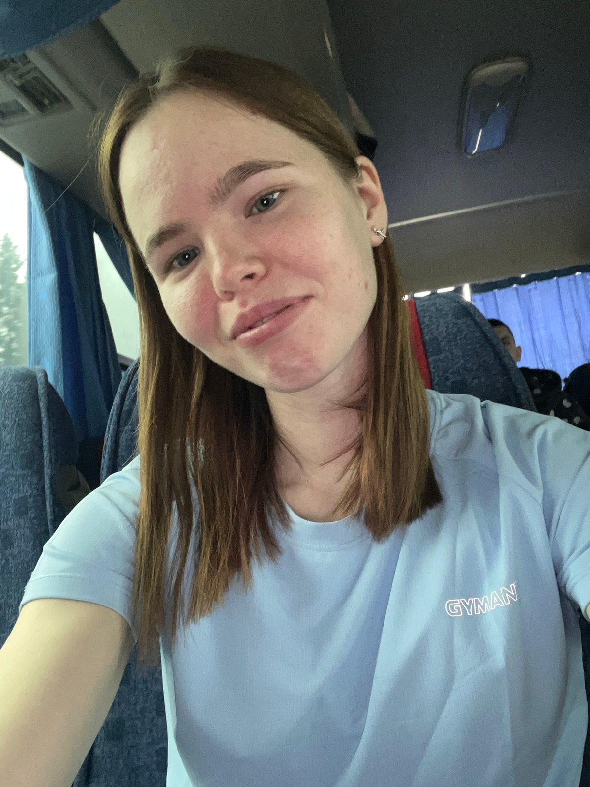 Woman takes selfie on bus in Russian town