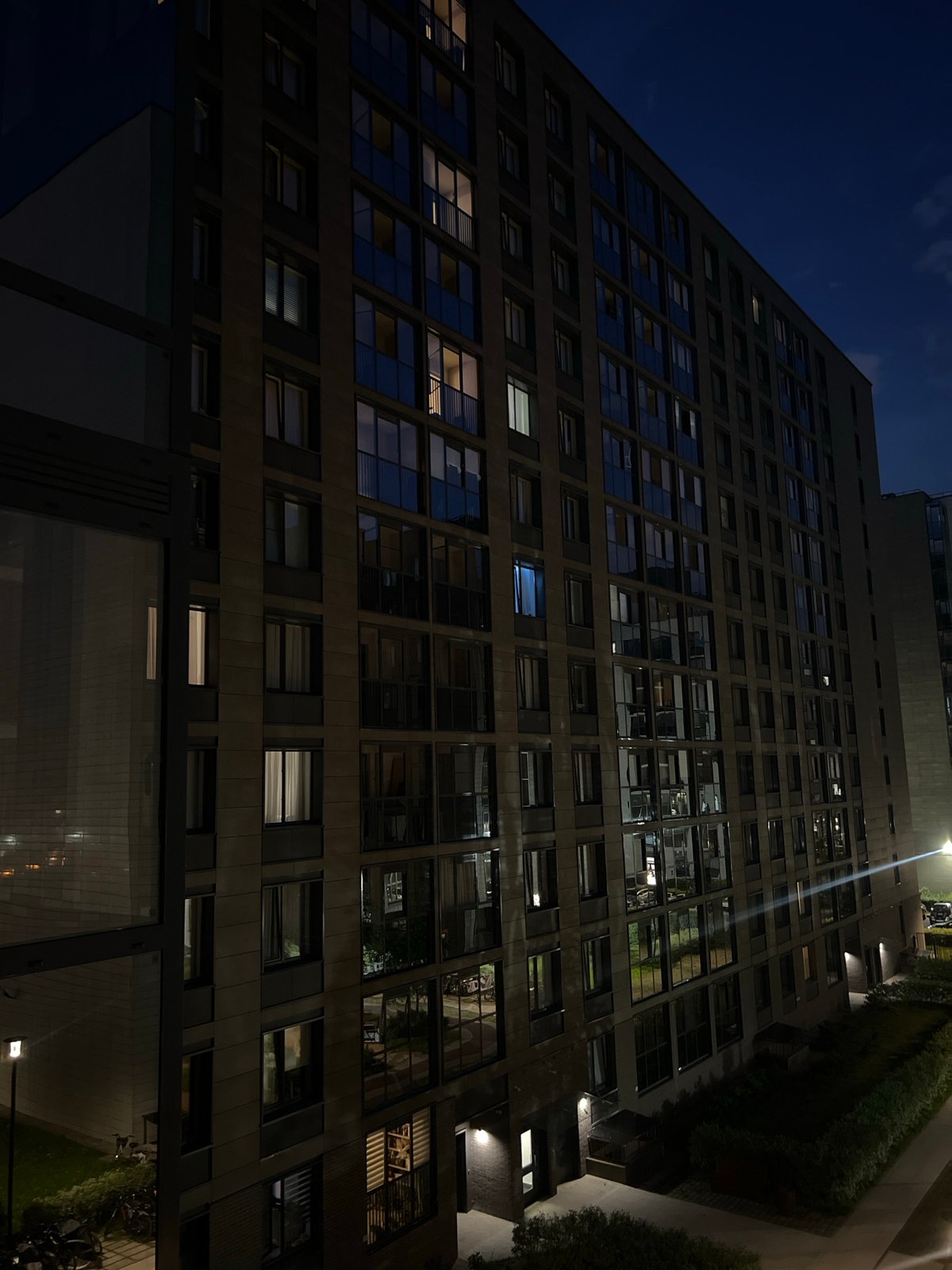 Night views captured of modern apartment complex in Sinyavino
