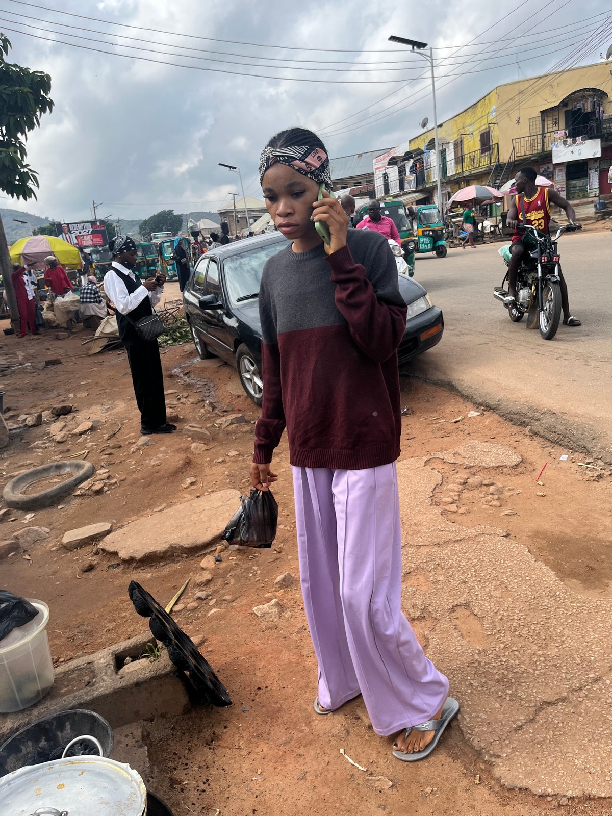 Street life, markets, and landscape along a Jos morning