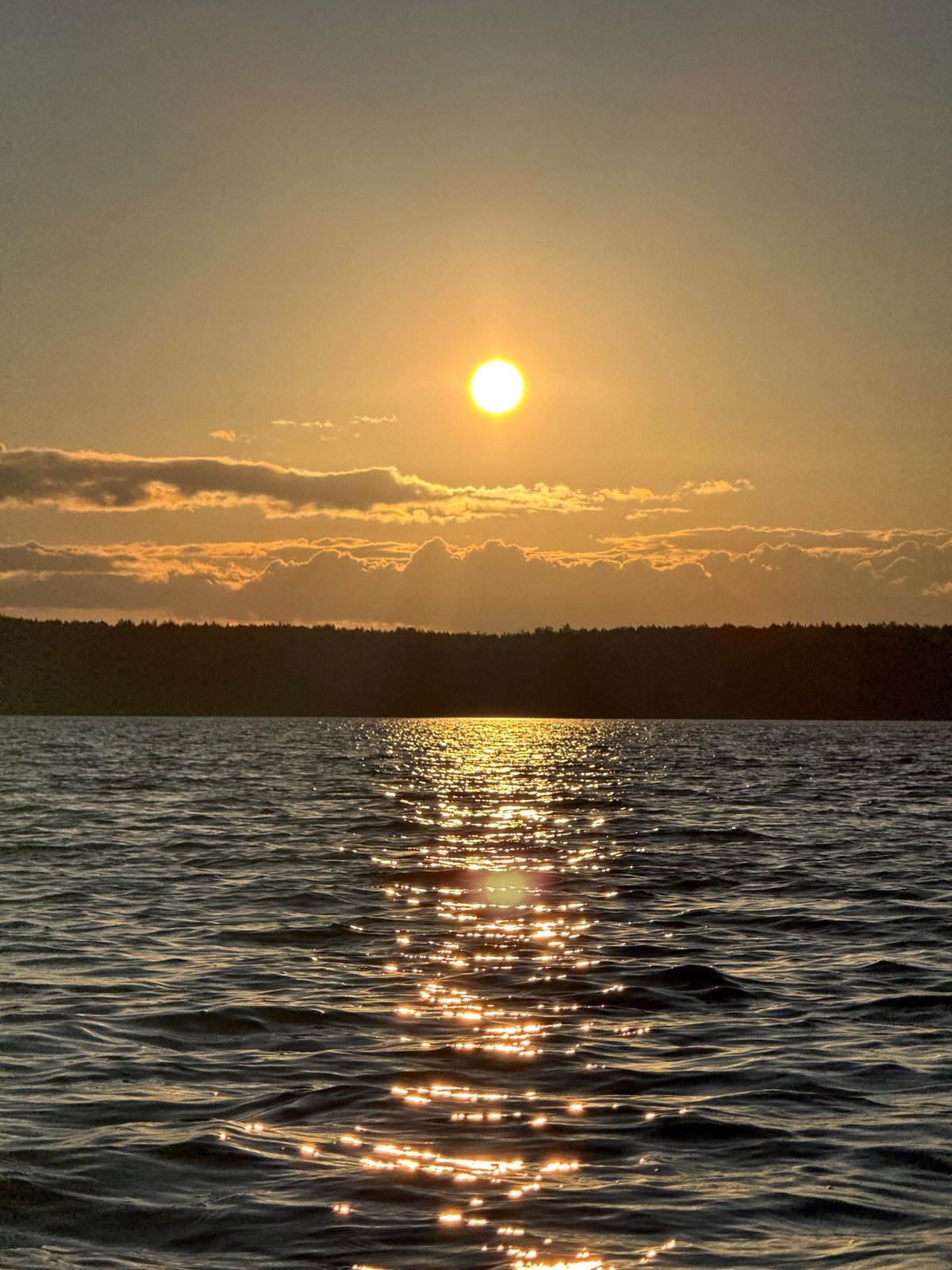 Sunset paddleboarding session captured on Russian lake