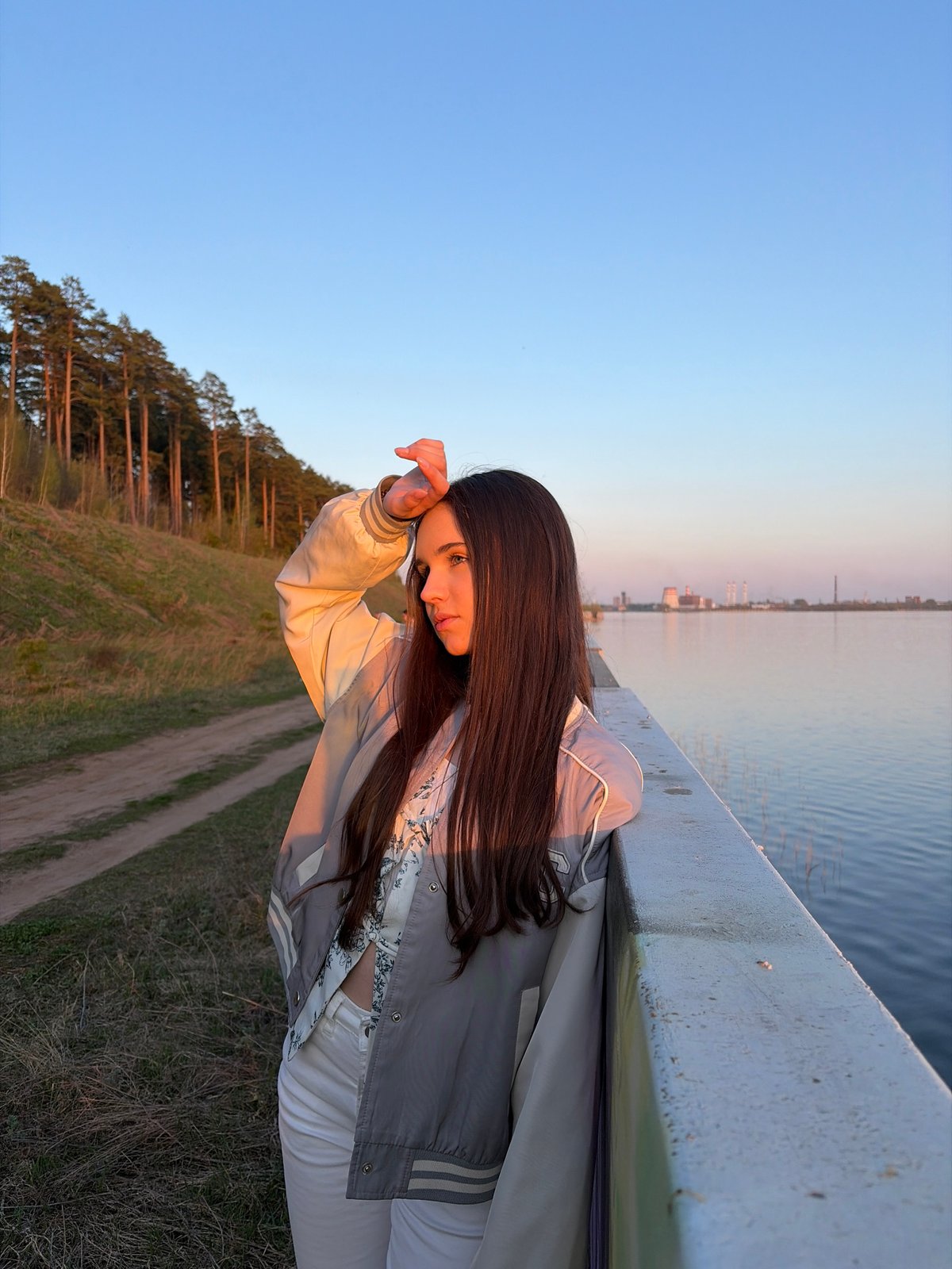 Woman photographed at sunset near Izhevsk Pond, Russia