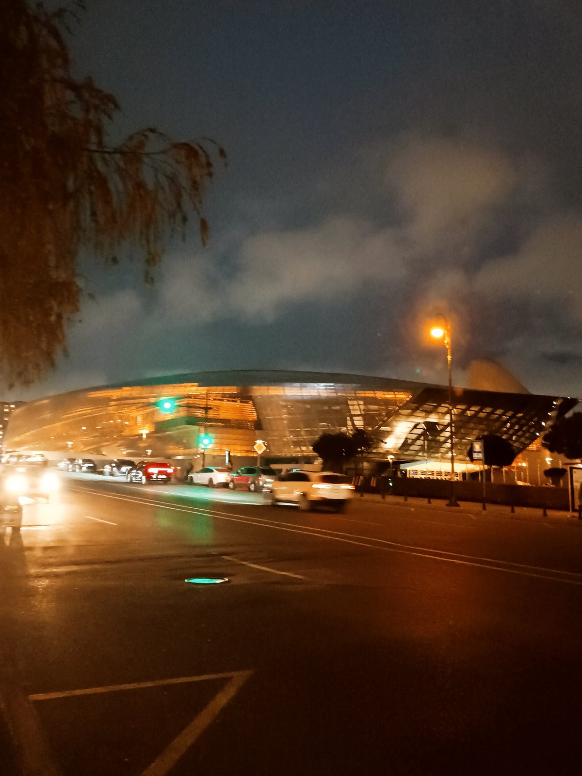 Evening street scenes documented around illuminated Baku landmarks