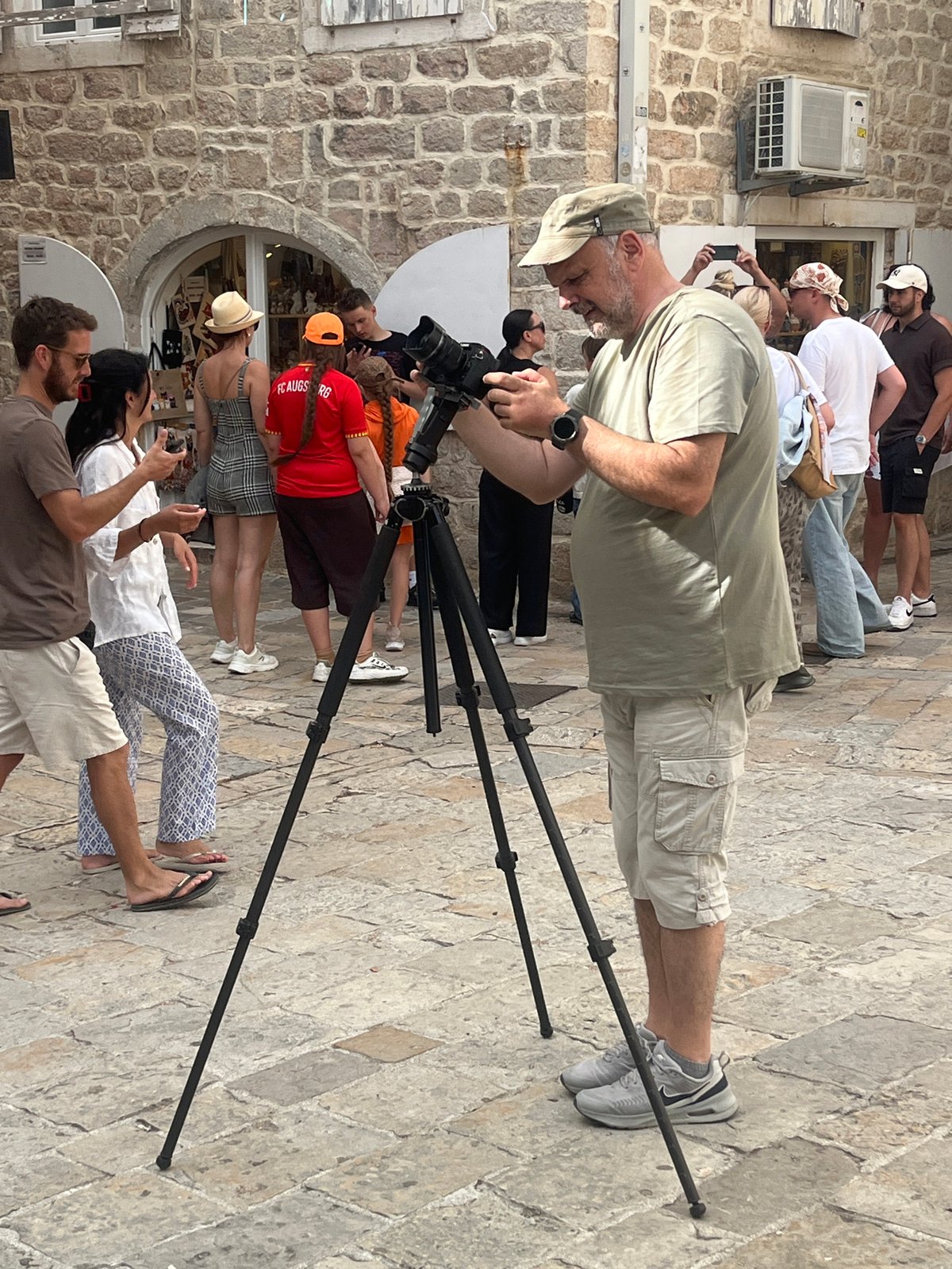 Afternoon pedestrian activity documented in Budva's historic Old Town