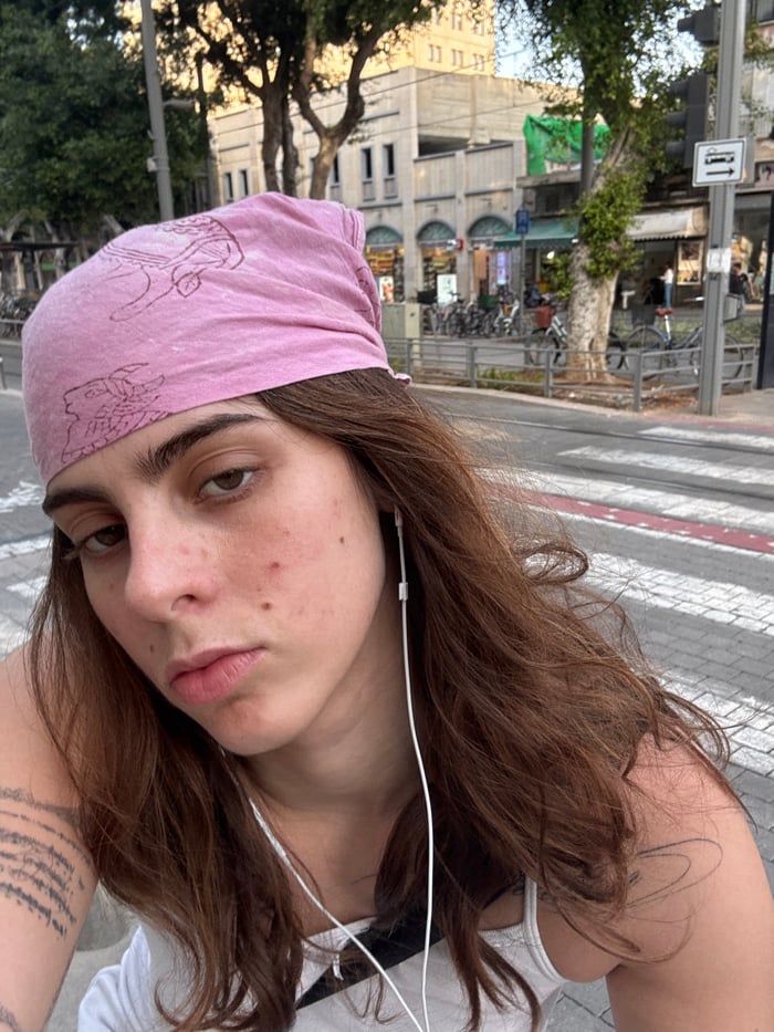 Young woman photographed in Tel Aviv selfie session