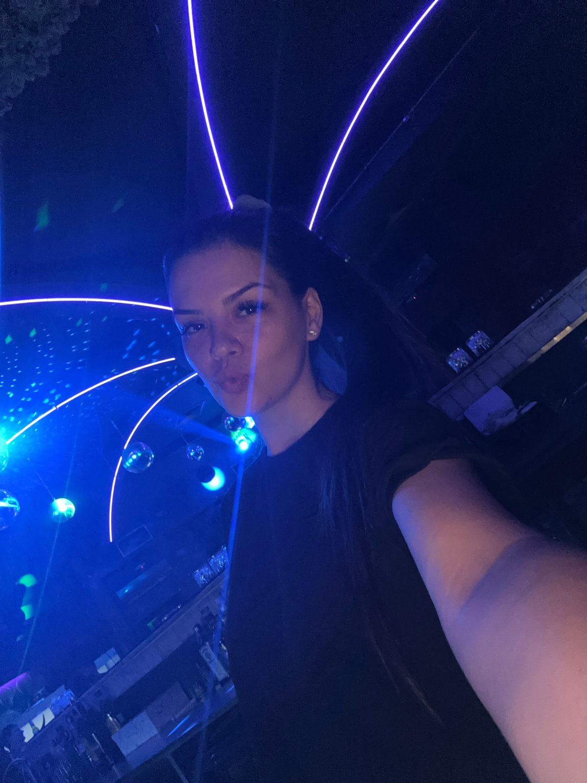 Selfies in a neon-lit nightclub in Sliven, Bulgaria