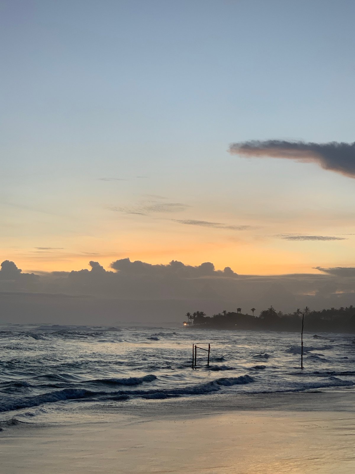 Families enjoy sunset beach time along Sri Lankan coast