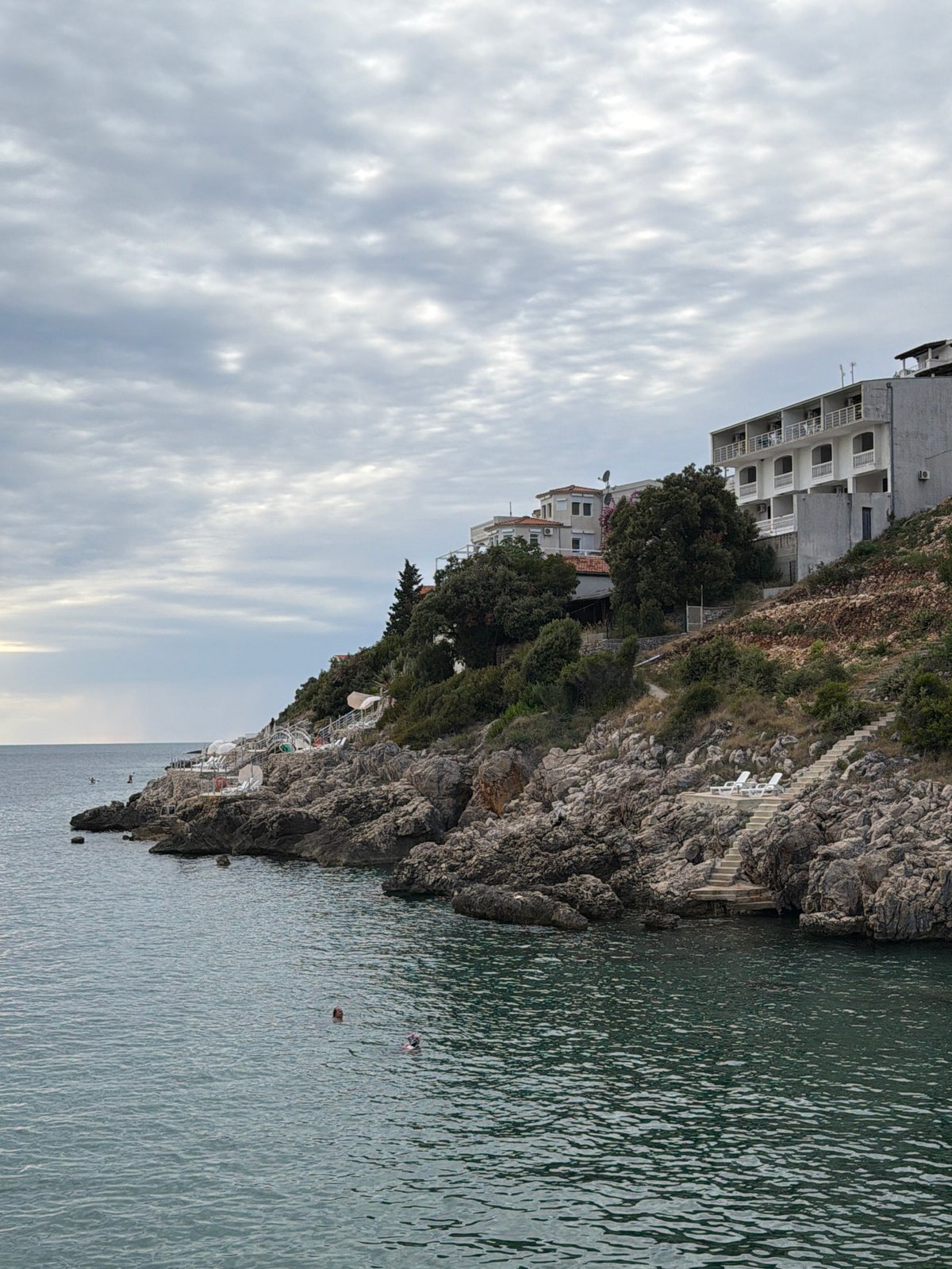 Lazy summer afternoon on a Montenegrin pebble cove