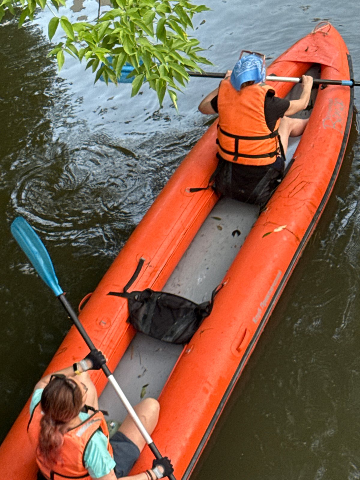 Kayaking a calm Moscow river on a summer afternoon