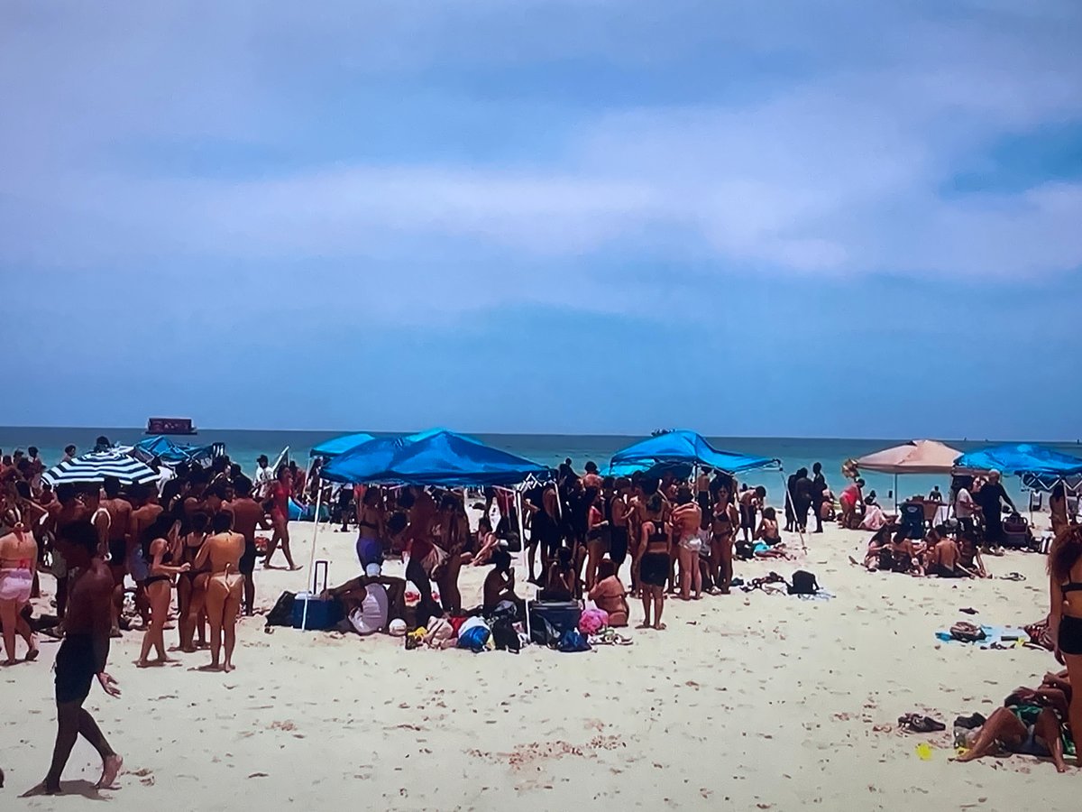 Crowded summer beach day with a fashion edge, Shakhovskaya