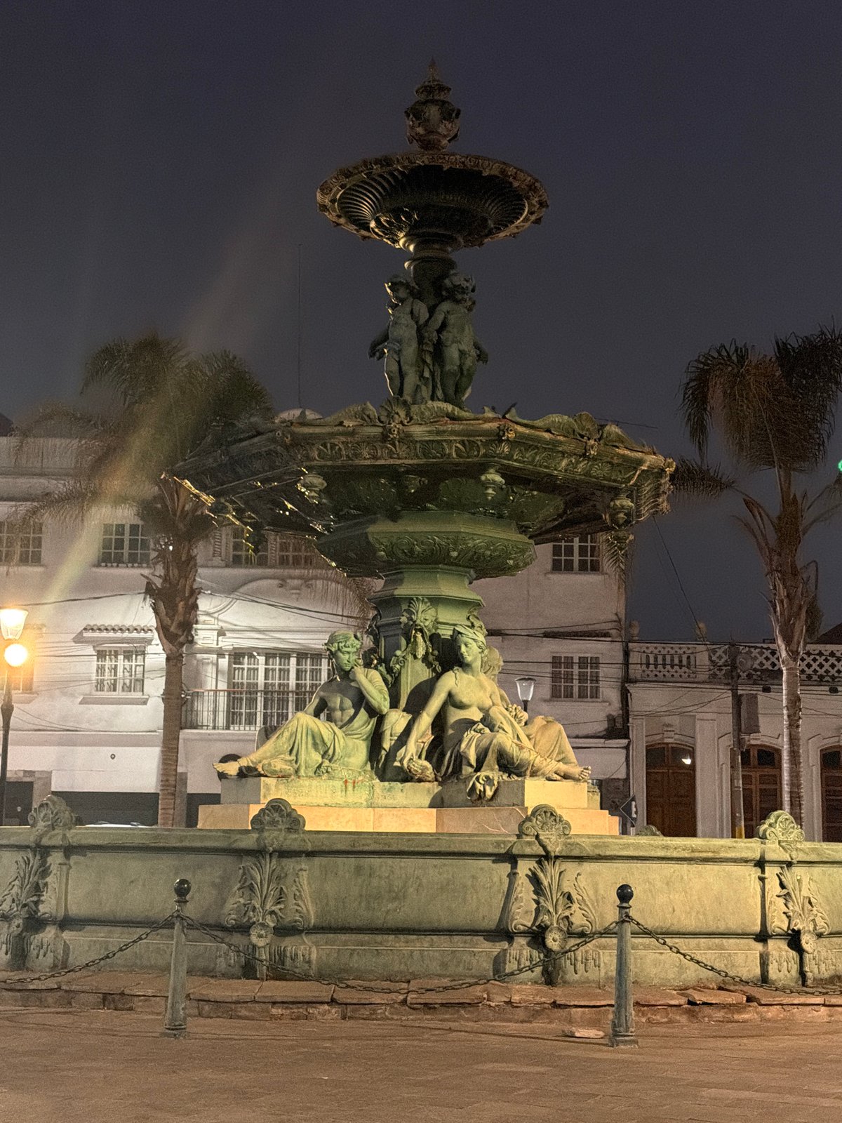 Nighttime scenes documented across historic downtown Tacna, Peru