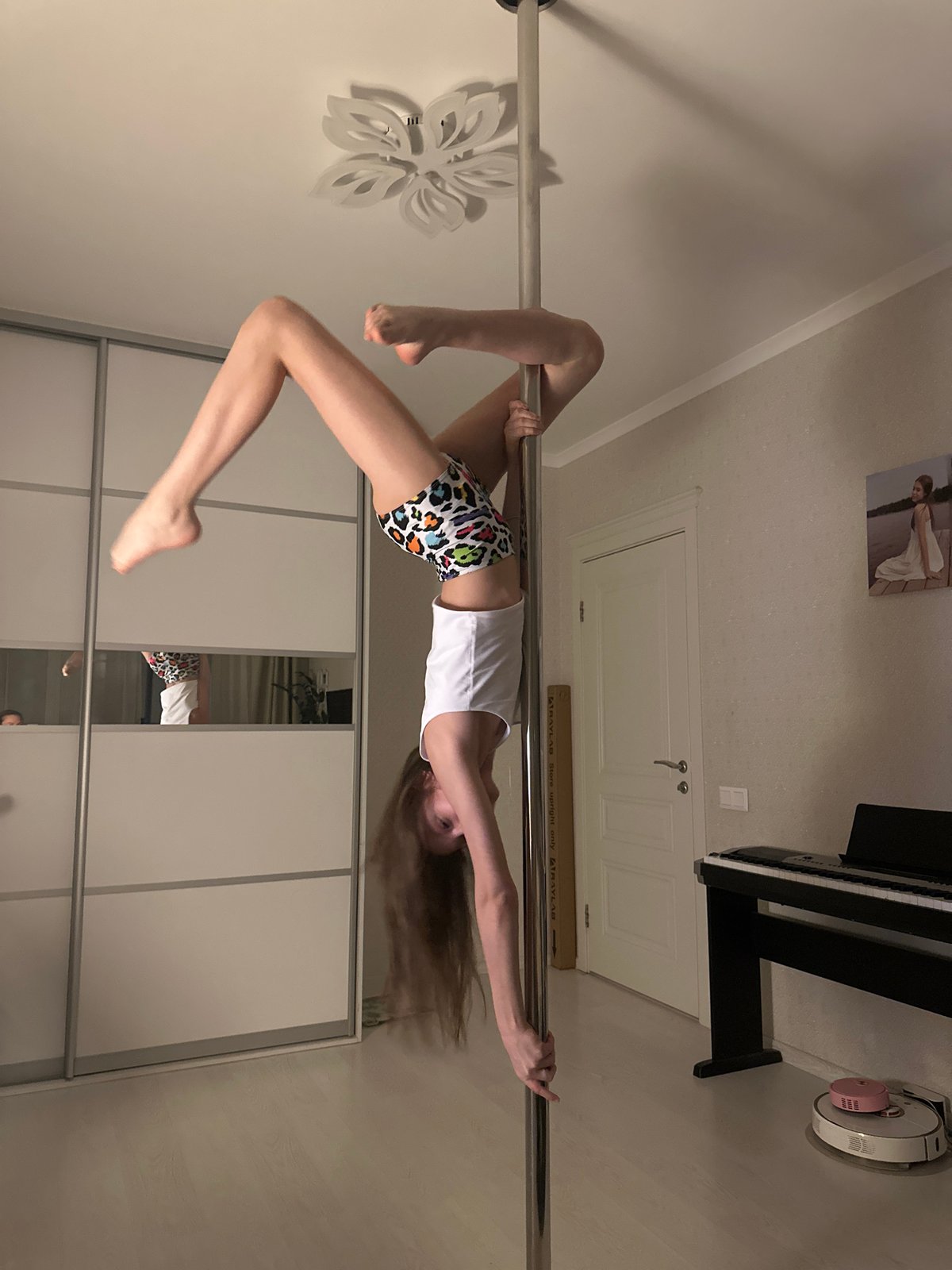 Woman practices pole dancing in Tomilino, Russia indoor venue