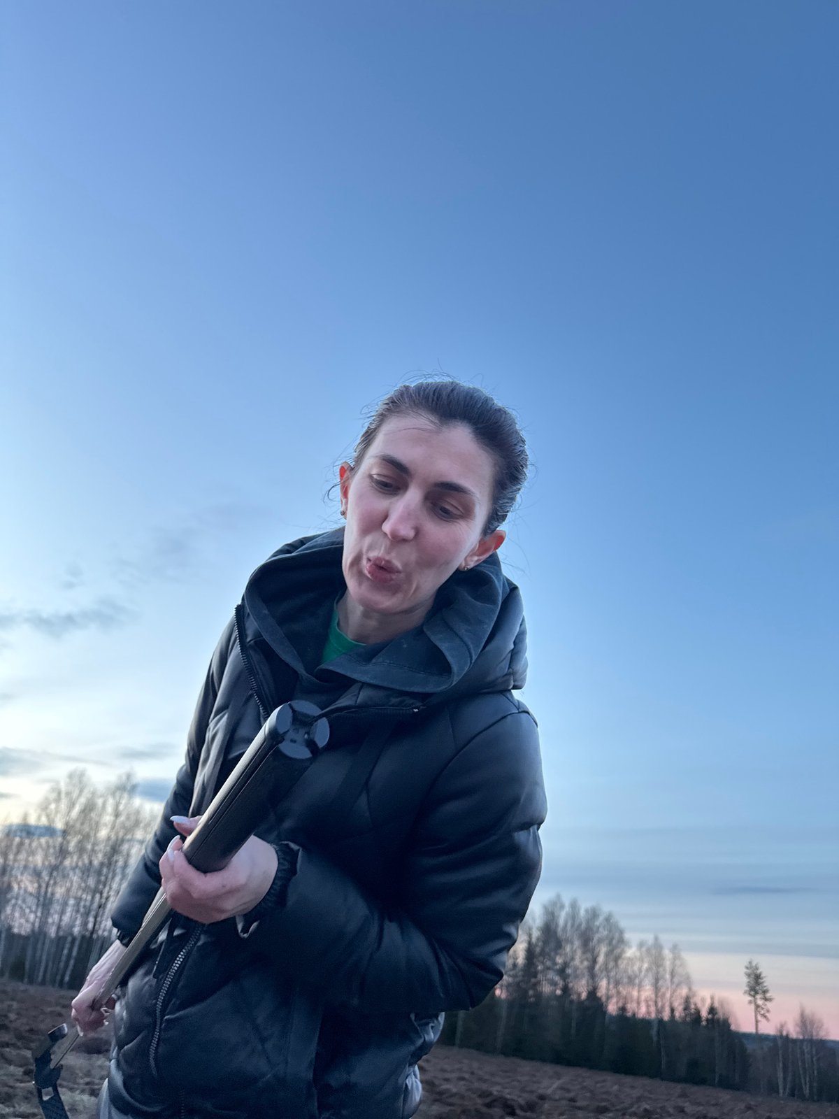 Woman conducts field work with equipment in Vassyata, Russia