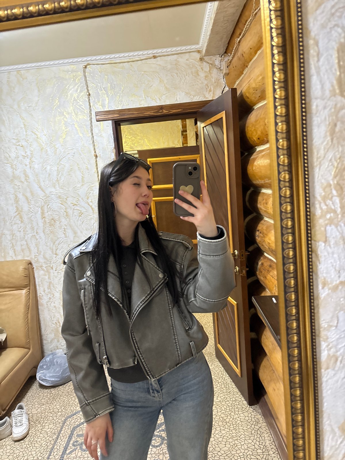 Woman records selfie content in Chaikovsky apartment