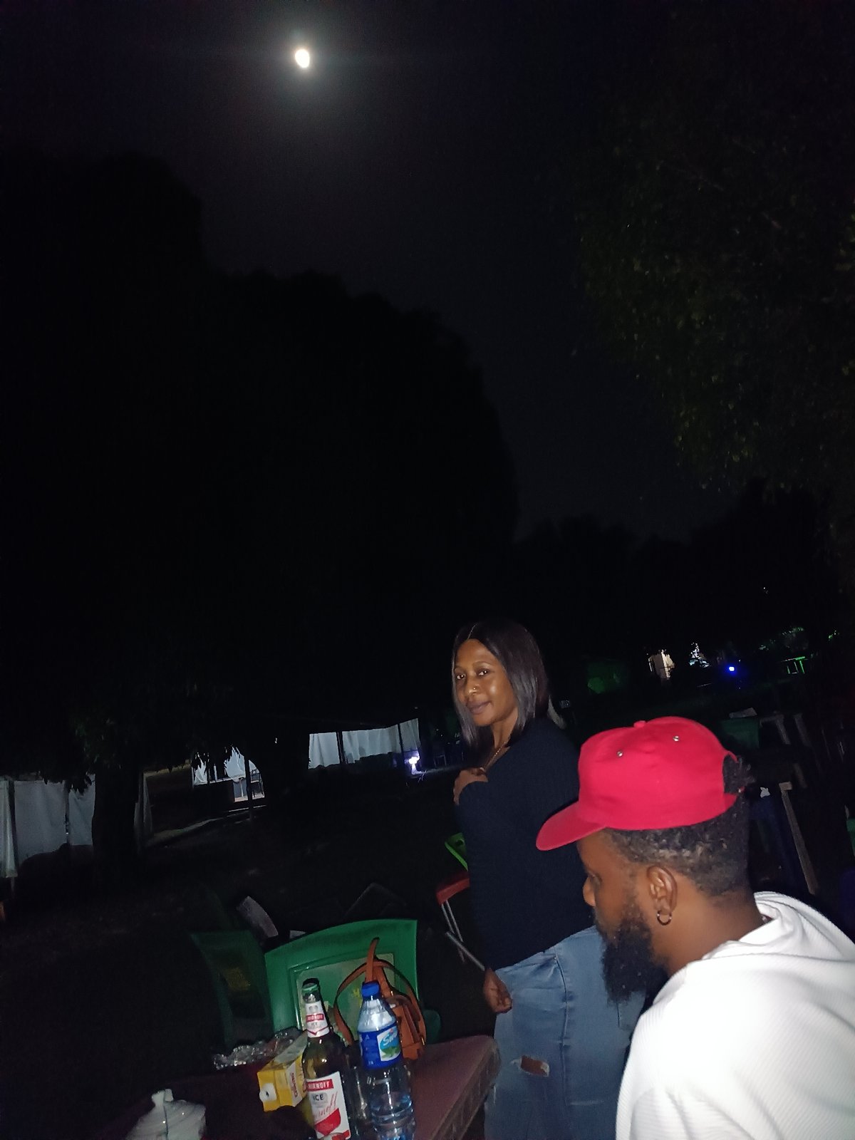 Late-night hangout under a full moon in Jos, Nigeria