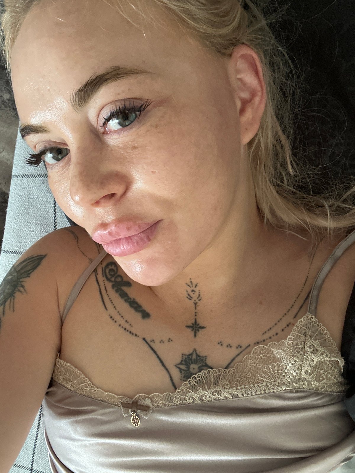 Blonde woman's bedroom selfie session captured by multiple witnesses