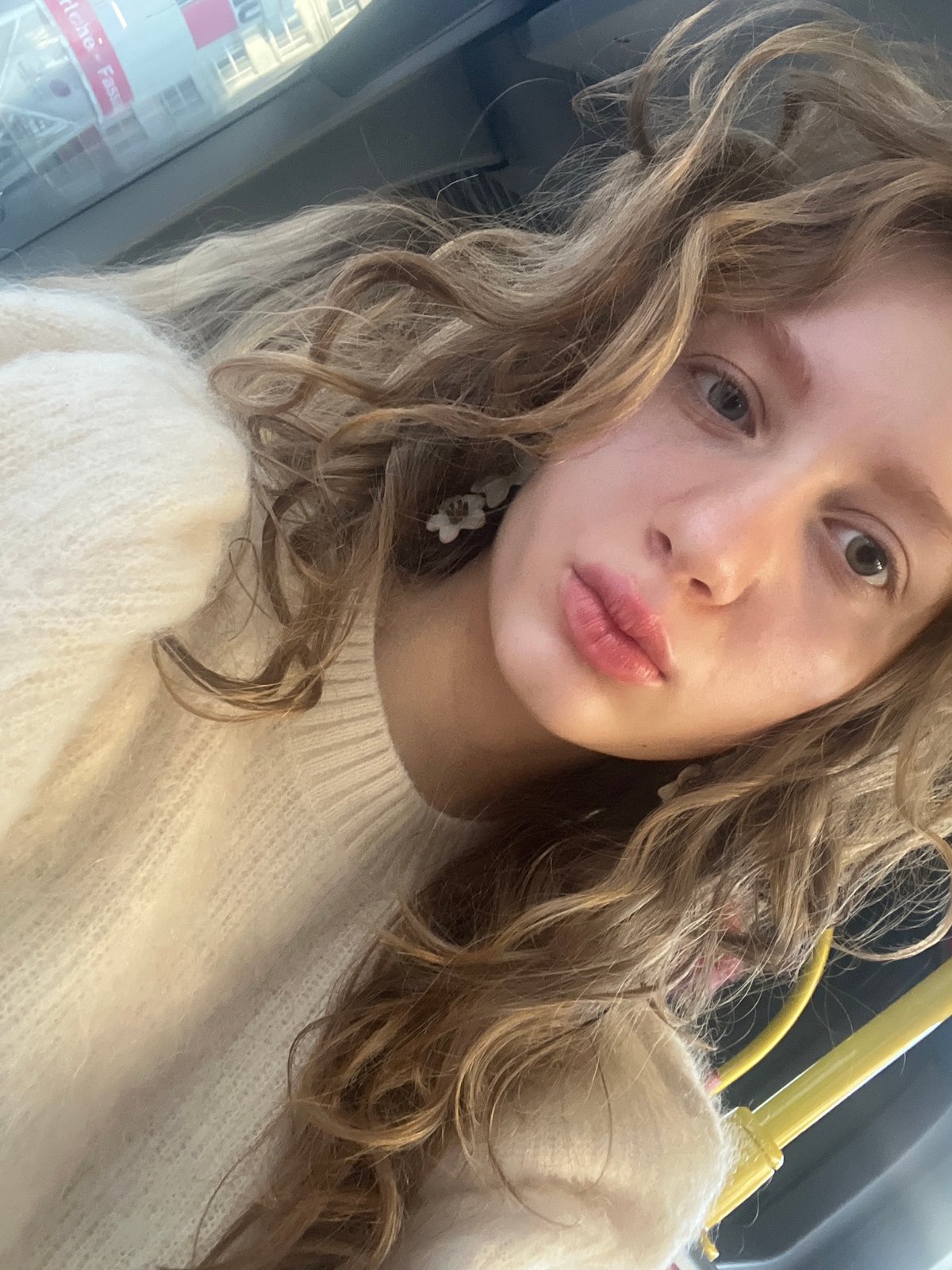 Woman takes early morning selfie on Vienna public transport
