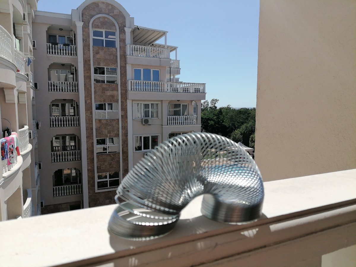 Balcony still lifes: everyday objects arranged on a sunny morning