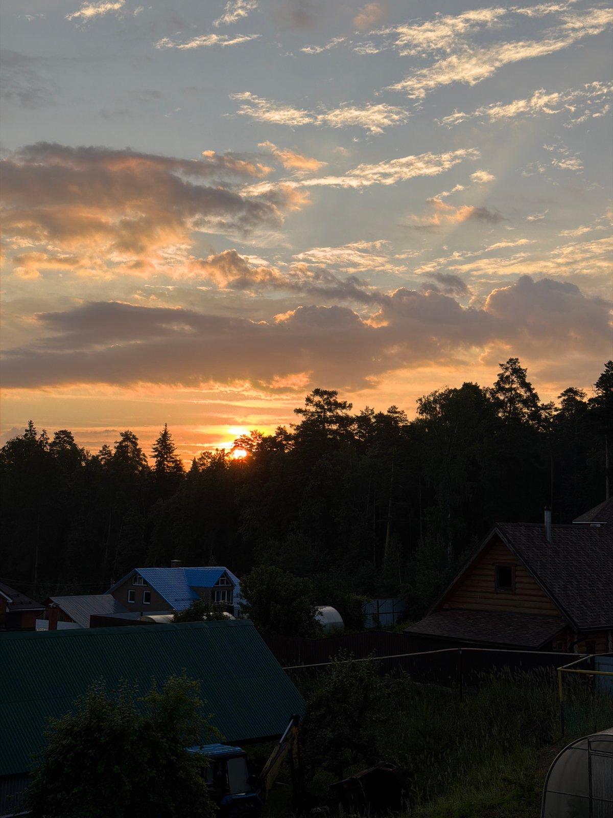 Sunset over Chaikovsky's forests, with a selfie in the mix