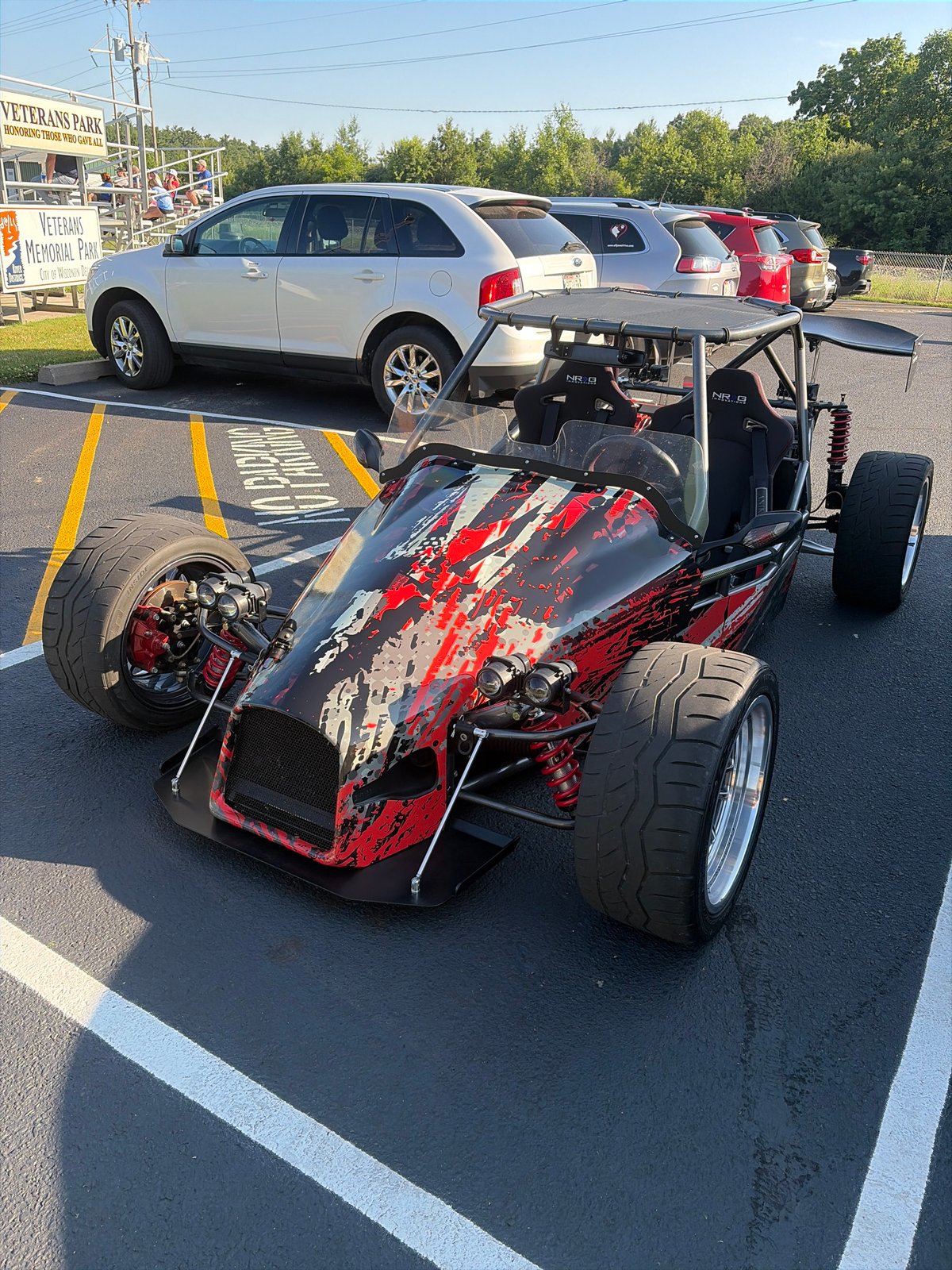 Custom red, white, and black vehicle at Wisconsin Dells memorial park