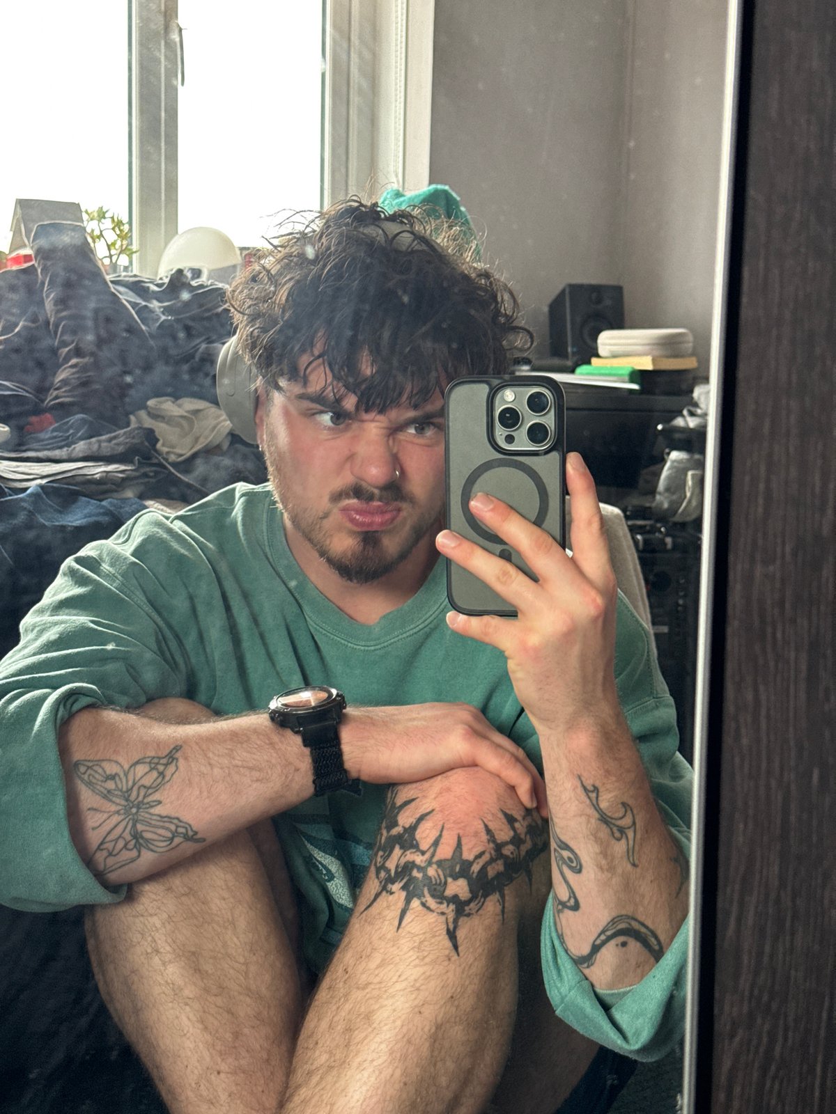Casual moments captured: selfies, drinks, and scattered belongings
