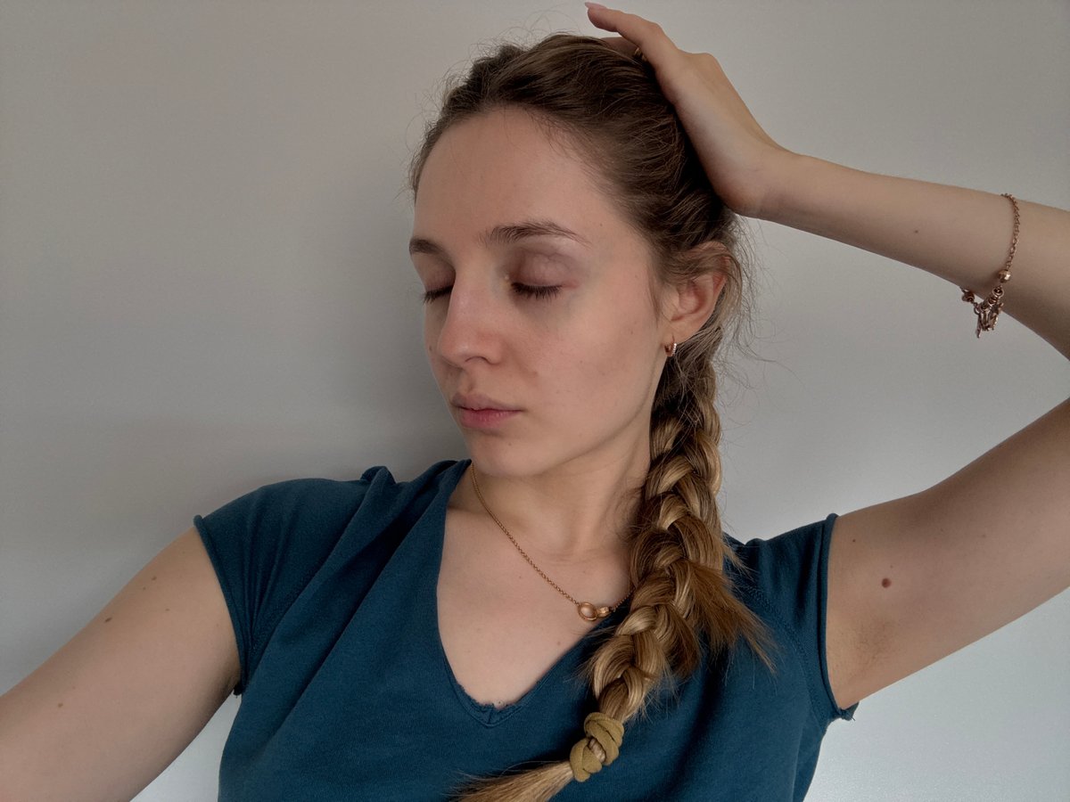 Young woman photographs indoor portrait session in Mexico City