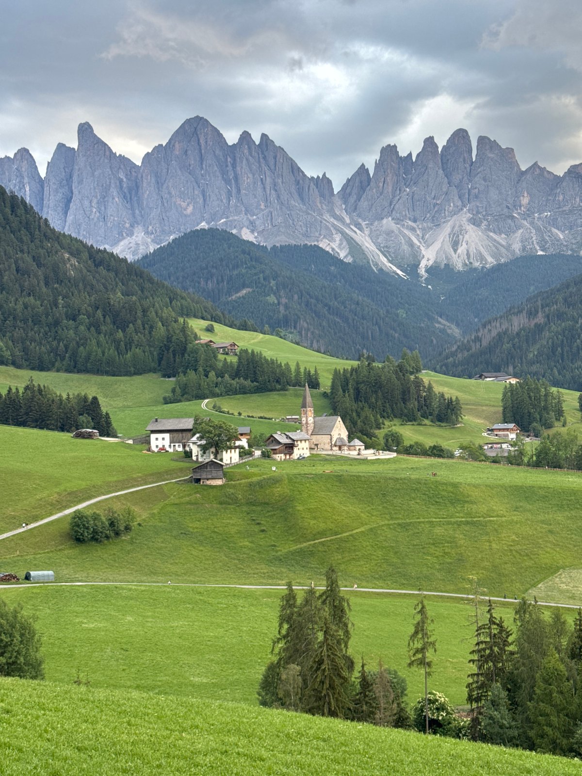 St. Magdalena village framed against the Dolomites, Val di Funes